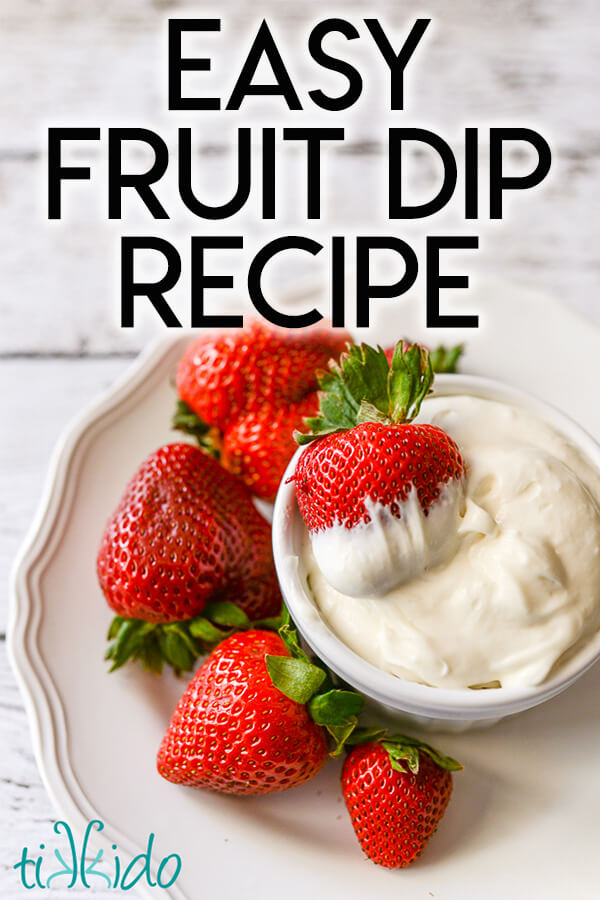 Fruit dip in a bowl surrounded by strawberries, with text overlay reading "Easy Fruit Dip Recipe."