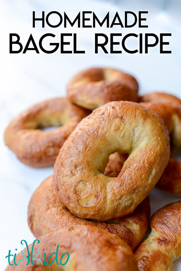 Homemade bagels made with an easy bagel recipe, on a white marble surface.
