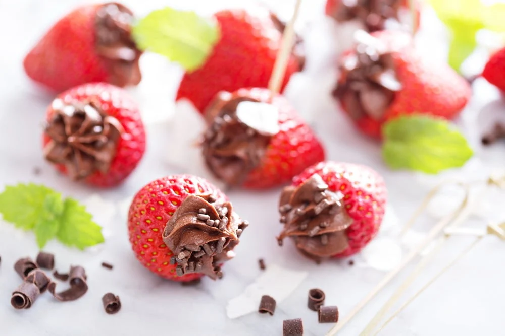 Chocolate stuffed strawberries for a Chocolate Covered Strawberry Valentine's Ideas Roundup.