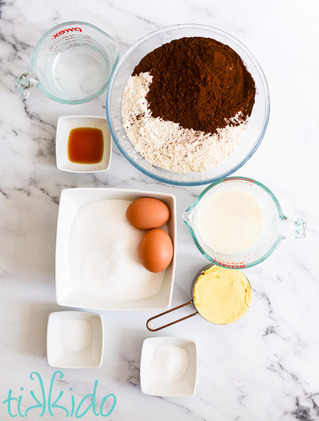 Ingredients for Chocolate Whoopie Pie Recipe on a white marble surface.