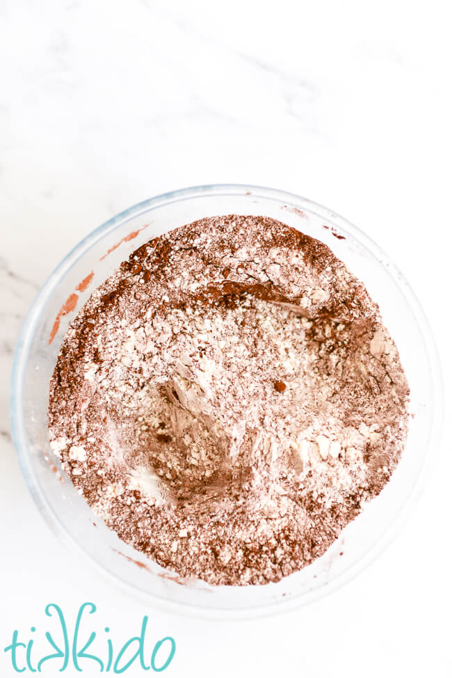 Dry ingredients for Amish Whoopie Pie Recipe mixed in a glass bowl.