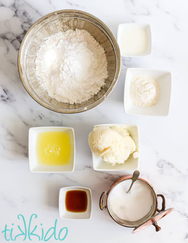 Ingredients for Whoopie Pie Filling measured out on a white marble surface.