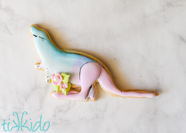 Slangaroo GISHWHES 2016 mascot sugar cookie in pastel colors on a white marble background