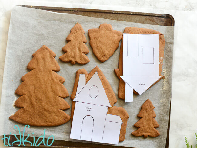 Gingerbread House Candle Holders baked and being trimmed using the gingerbread house templates.