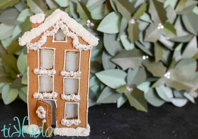 Gingerbread house townhouse candle holder for a gingerbread mantel display.
