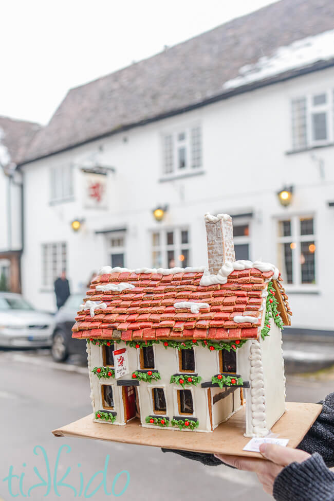 Gingerbread replica of the Lower Red Lion pub in front of the actual pub in St Albans, England.