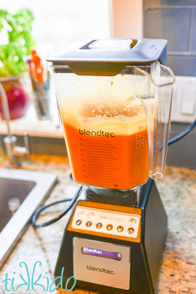 Peaches being blended in a blendtec blender for peach Pate de fruits