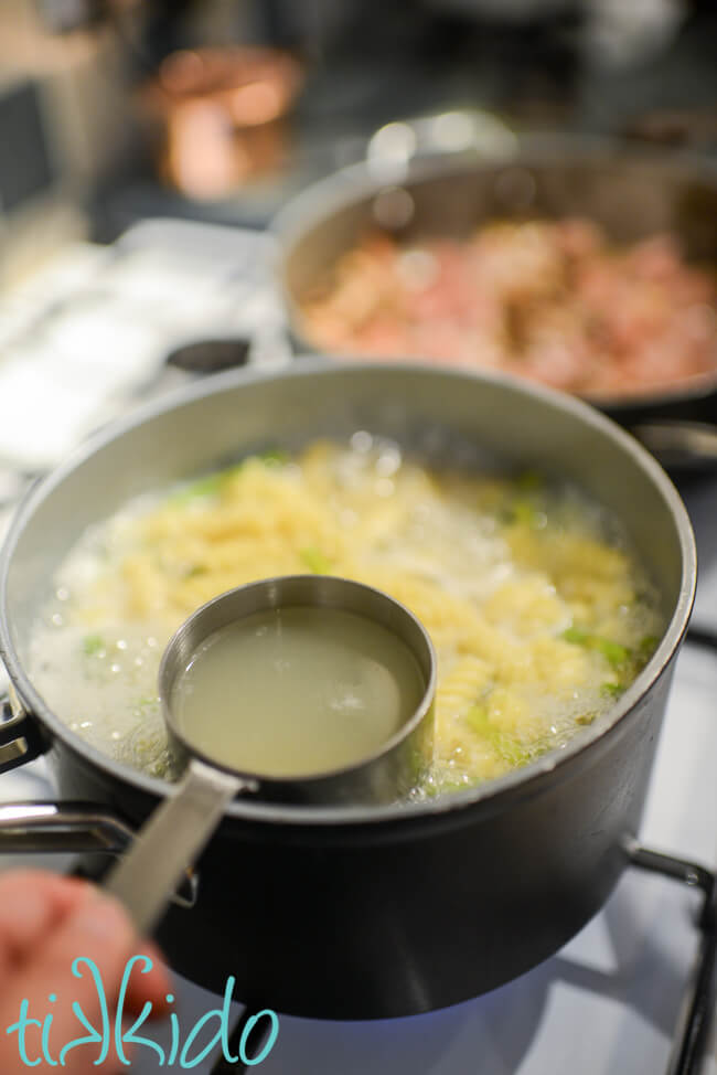 Reserving some of the starchy pasta water for Recipe for Asparagus Pasta.