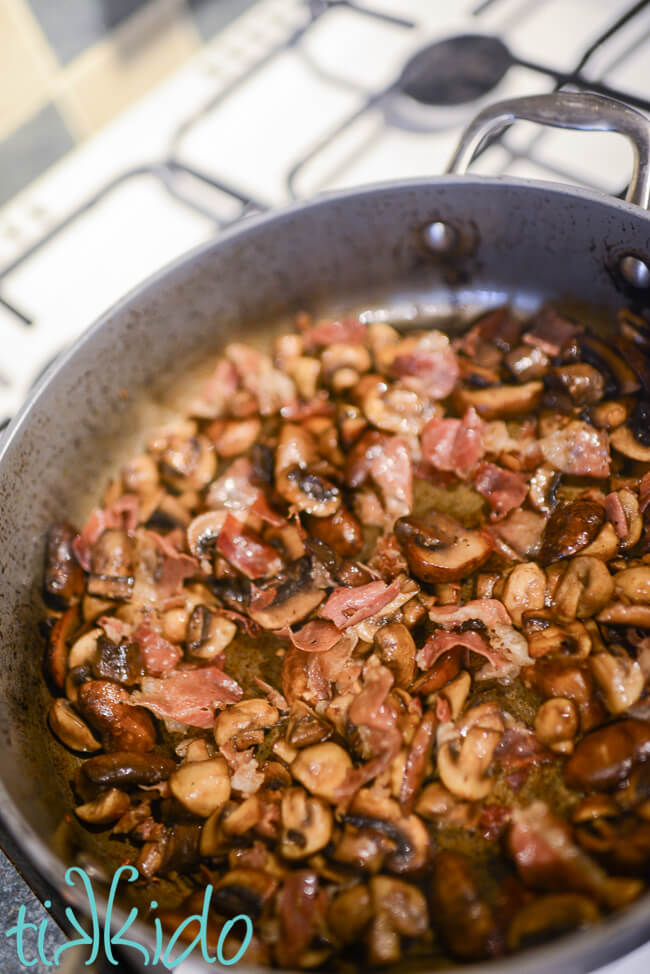 Sauteed mushrooms and prosciutto for the prosciutto, asparagus, and mushroom pasta recipe.