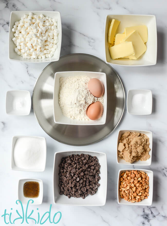 Ingredients for Rocky Road Pizza Cookie Recipe on a white marble surface.