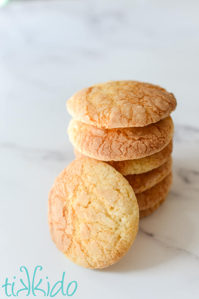 Stack of soft sugar cookies on a marble surface.