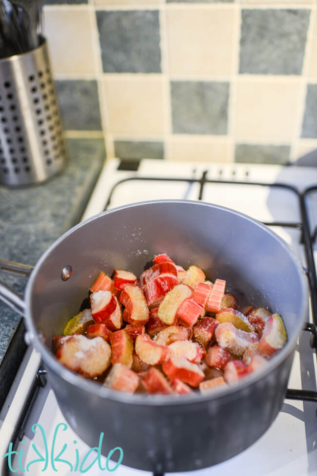 Frozen rhubarb and water in a saucepan for making a stewed Rhubarb Recipe.