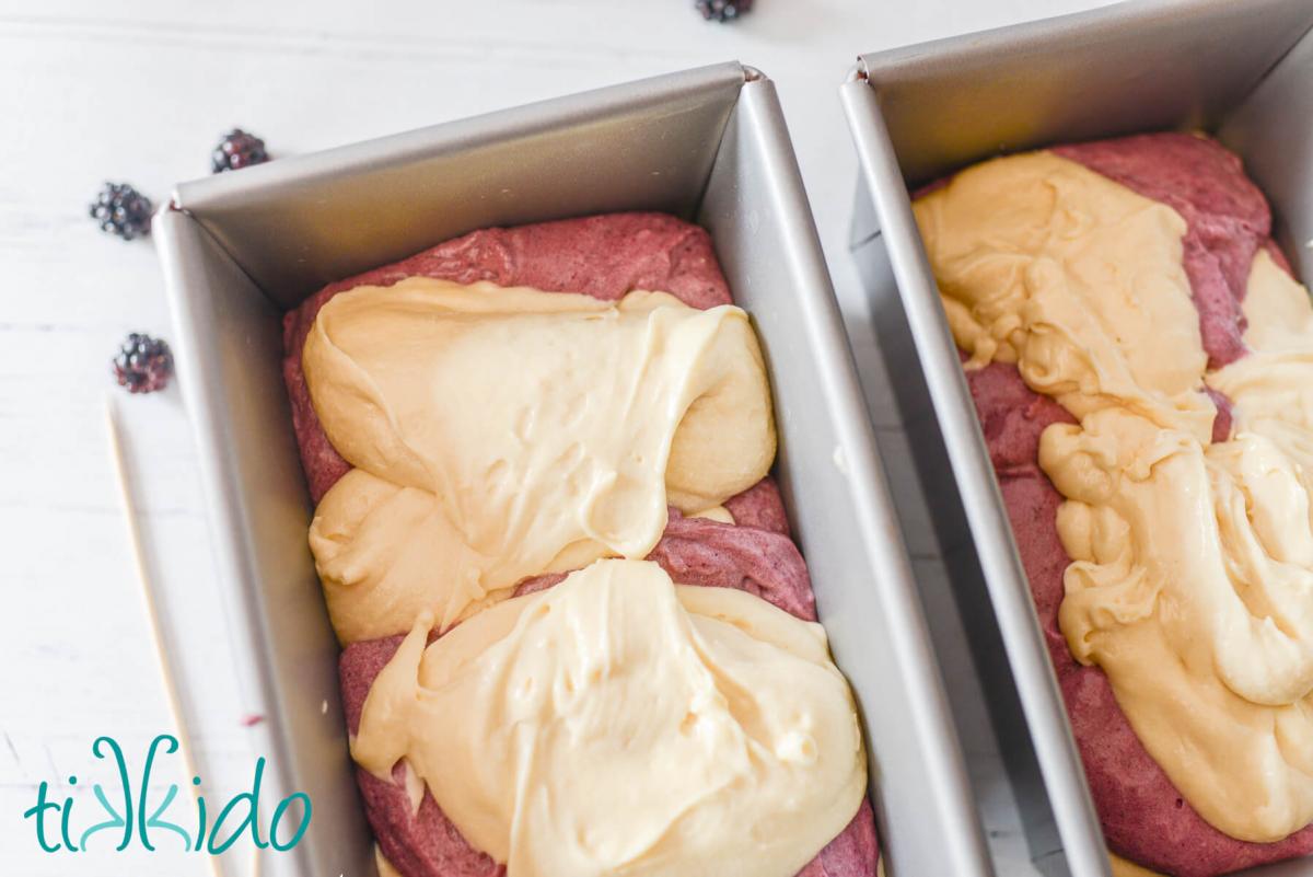 Blackberry Pound Cake Recipe Blackberry and vanilla pound cake batter layered in two bread loaf pans.