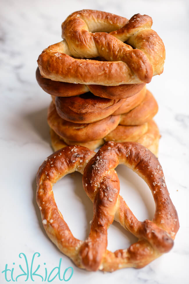 Stack of large Auntie Anne's copycat pretzels on a white marble surface.