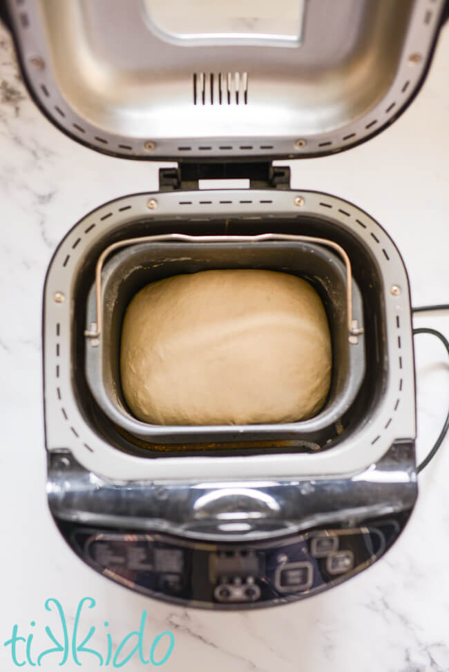 Bread machine full of dough to make Auntie Anne's Copycat Pretzels.