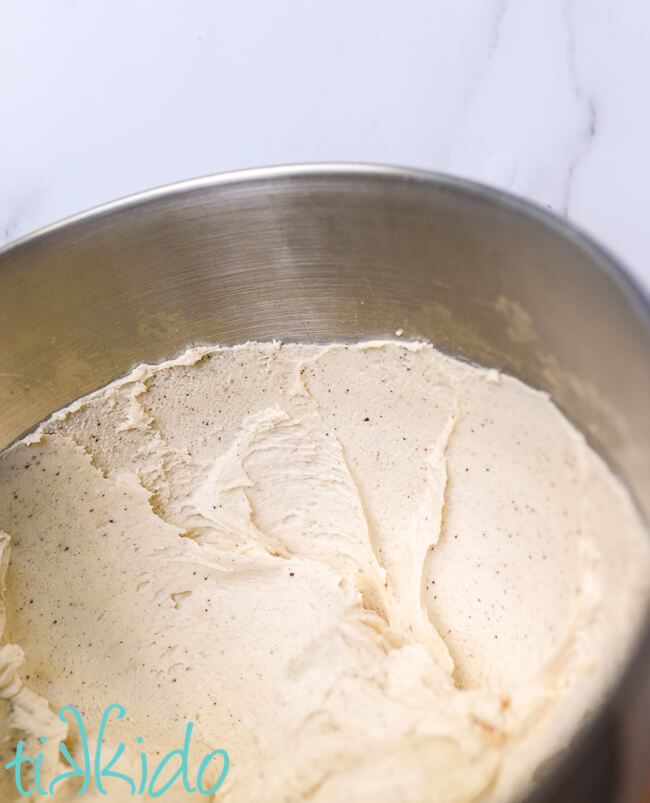 Browned Butter Frosting in a silver mixing bowl.