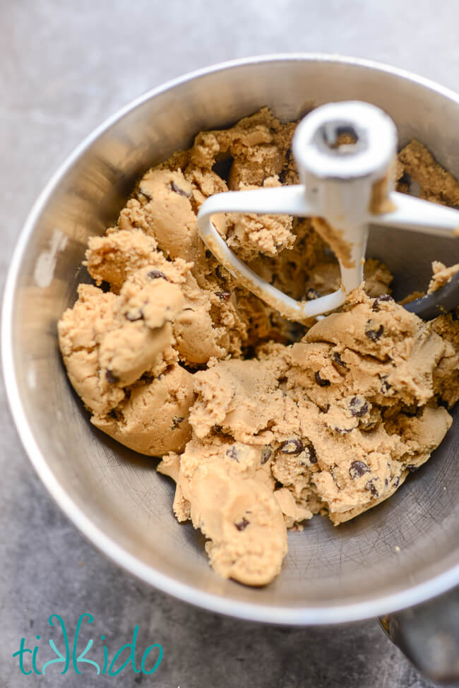 Browned Butter Chocolate Chip Cookie dough in a Kitchenaid mixing bowl.