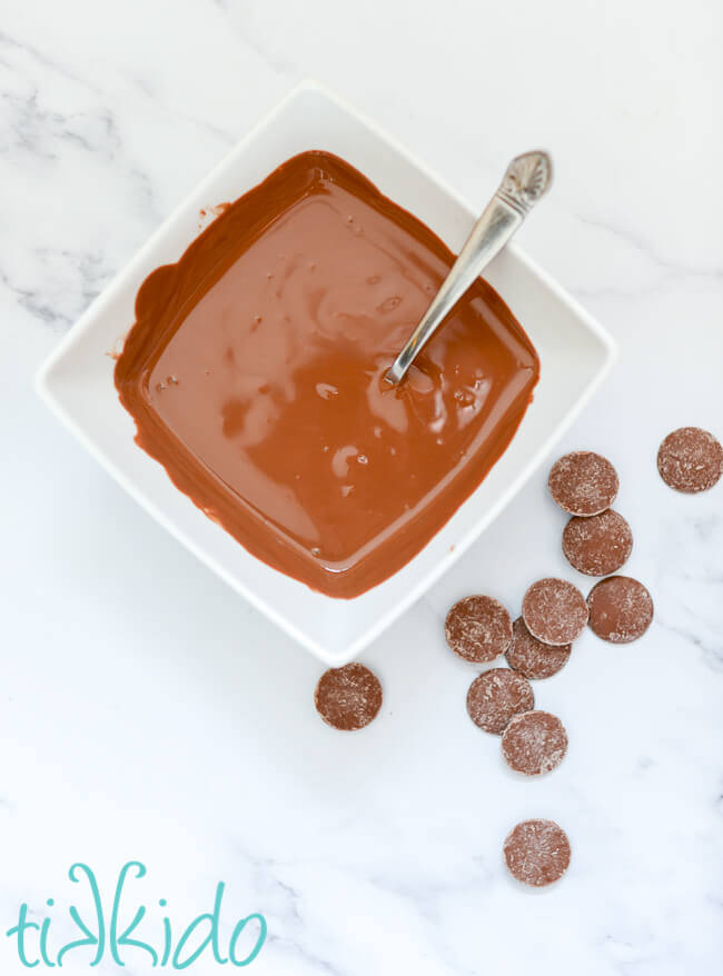 Melted chocolate for covering peanut butter balls to make Buckeye Candy.