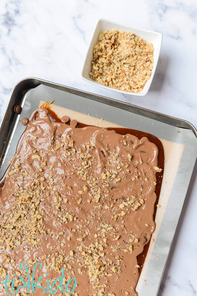 English toffee covered in chocolate and ground nuts.