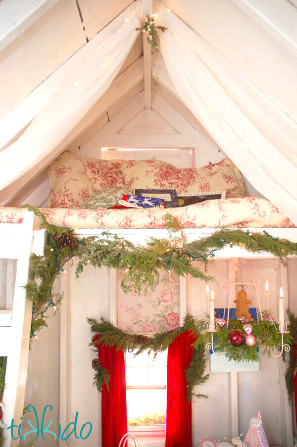 Felt mistletoe hanging from the ceiling of the Christmas Cottage play house.