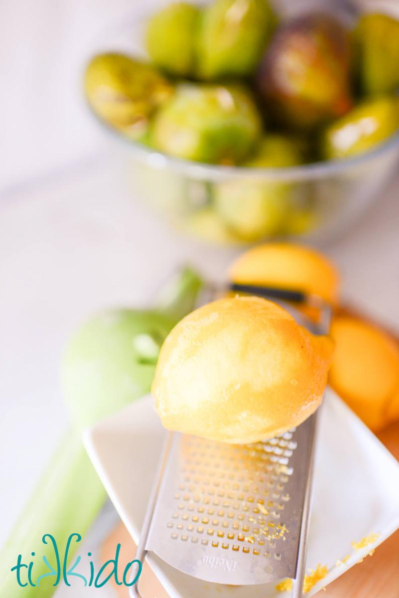 lemon being zested to make fresh fig jam.