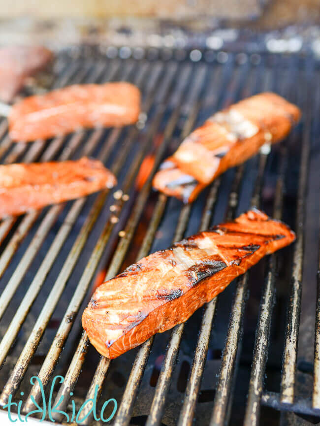 Marinated salmon being grilled