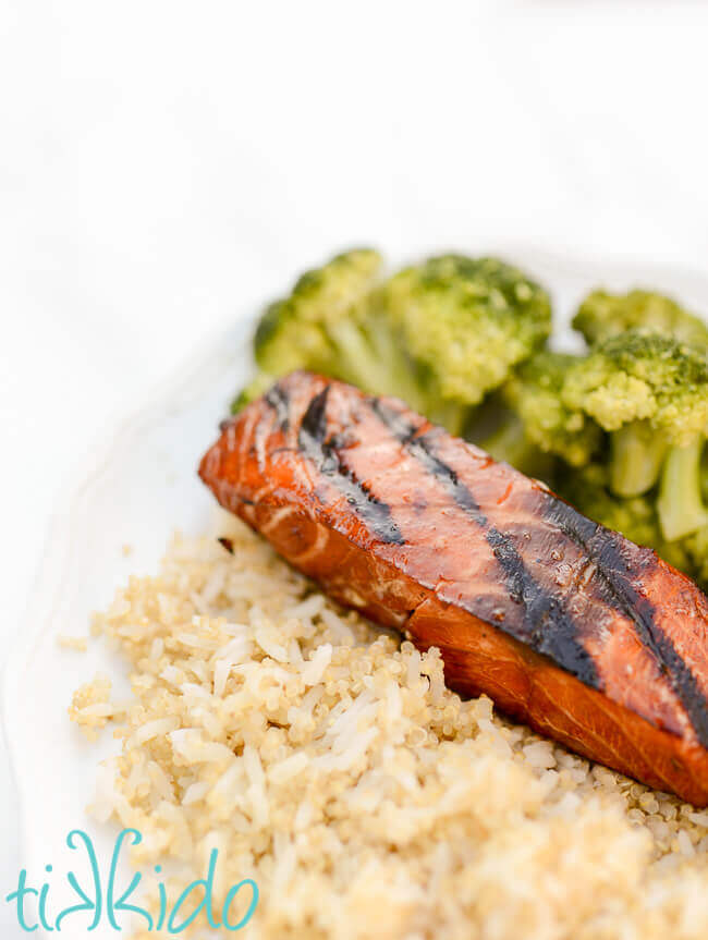 Grilled salmon with homemade teriyaki marinade on a plate with rice and broccoli