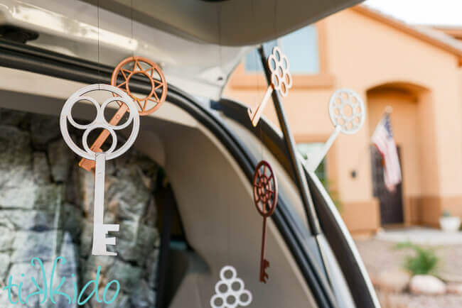 Harry Potter flying keys decorating a car for a Harry potter trunk or treat.