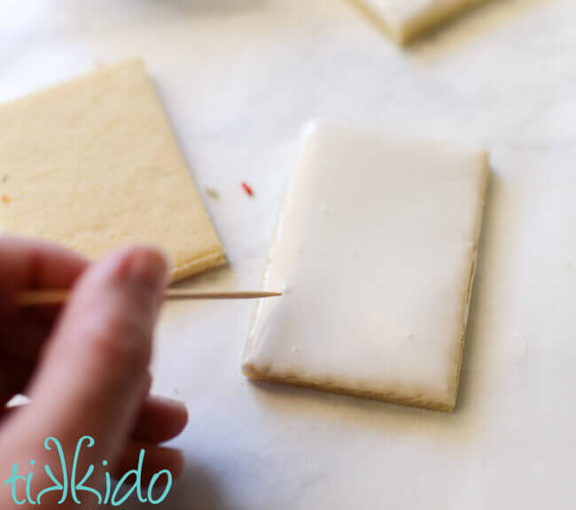 popping bubbles in cookies dipped in royal icing