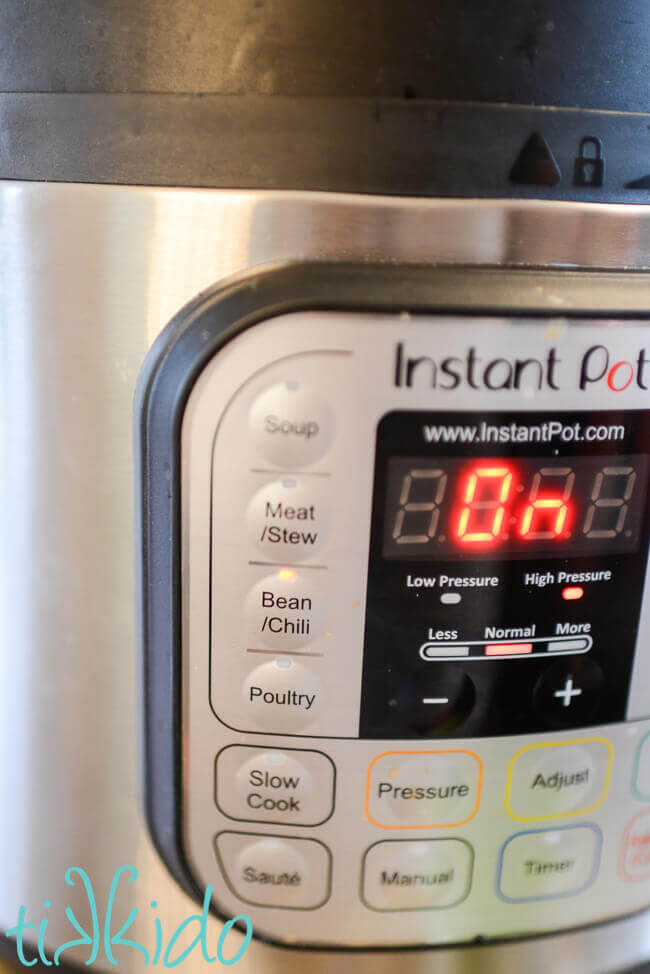 Instant pot pressure cooker set to the Bean/Chili setting