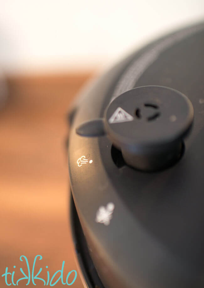 Pressure cooker set to vent for steaming the Christmas Pudding Recipe in an Instant Pot