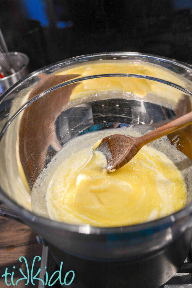 Hard sauce for Christmas Pudding Recipe being made in an improvised double boiler.