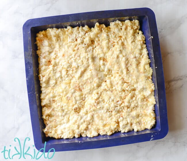 Pound Cake Popcorn Bars in a blue, square, silicone baking dish.