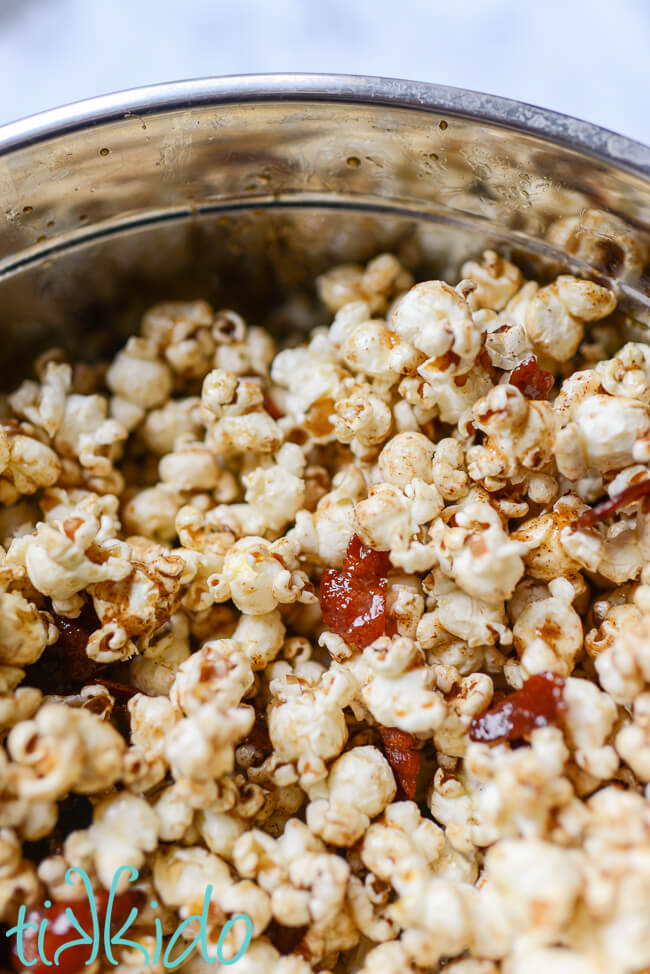 Large bowl of Maple Bacon Popcorn made with browned butter, maple syrup, and bacon bits.