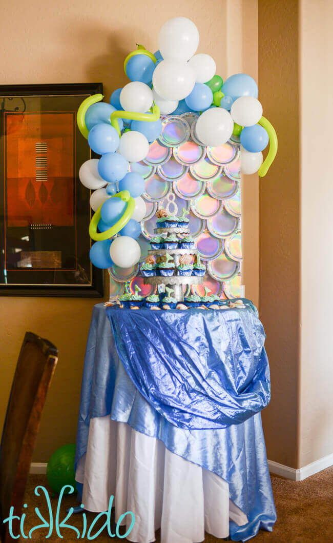 Mermaid backdrop made from paper plates.