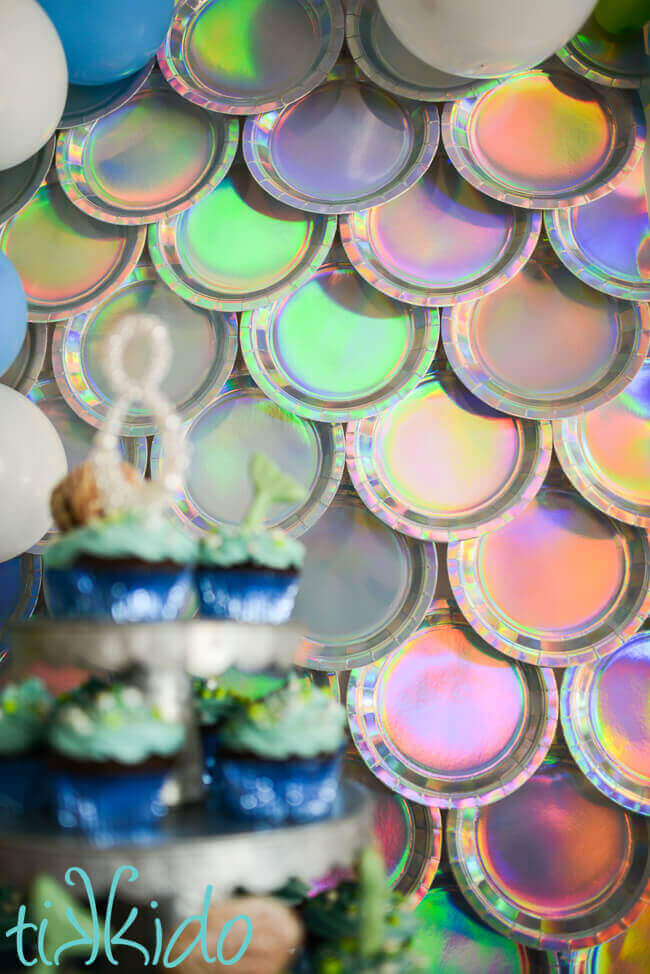 Mermaid backdrop for a mermaid party made from paper plates.