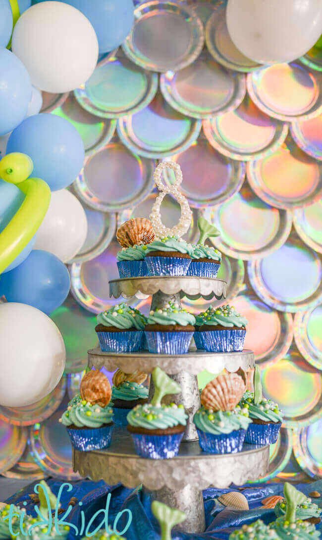 Mermaid backdrop for a mermaid party made from paper plates.