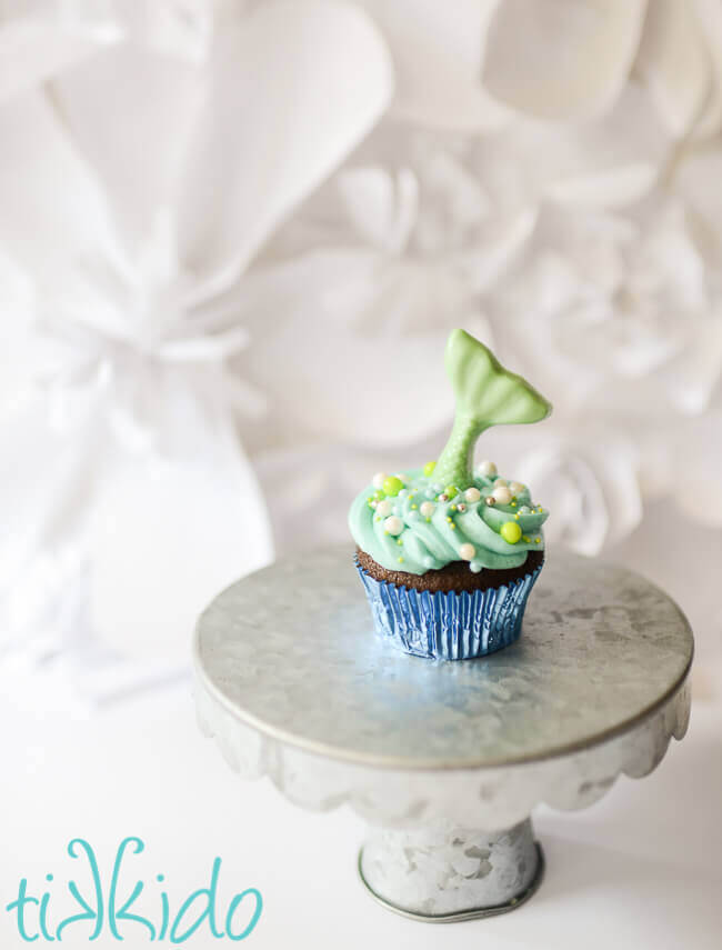 Chocolate mermaid tail cupcake topper on a mermaid cupcake.