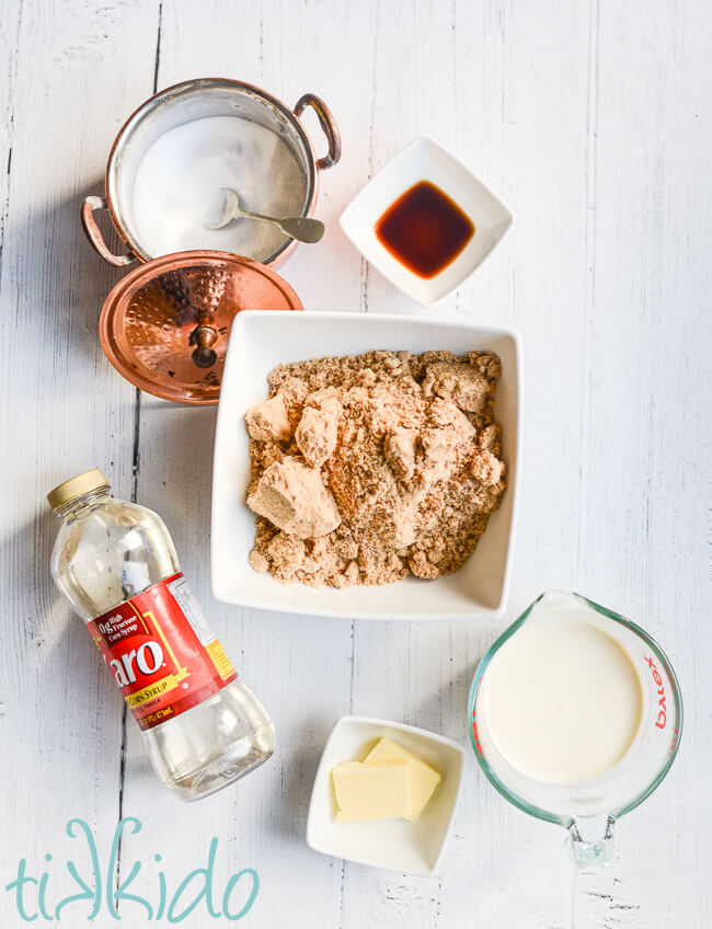 Ingredients for Old Fashioned Penuche Fudge Recipe on a white wooden surface.