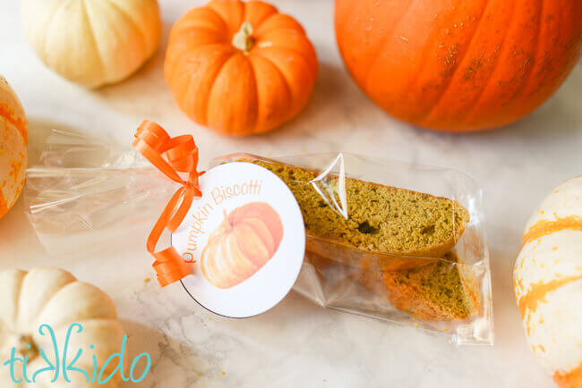 pumpkin biscotti packaged in a cellophane treat bag with a printable label.
