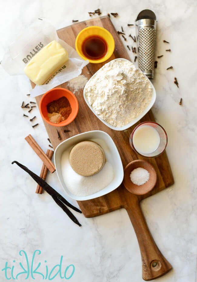 Pumpkin Spice Vanilla Wafer Cookies ingredients on a wooden cutting board.