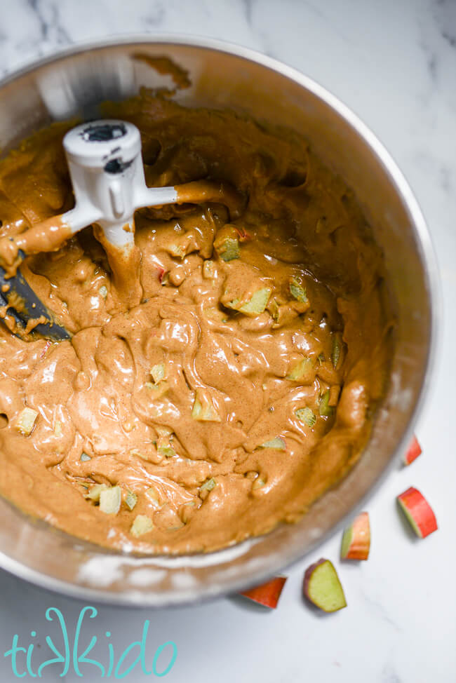 Rhubarb quick bread batter in a Kitchenaid mixing bowl.