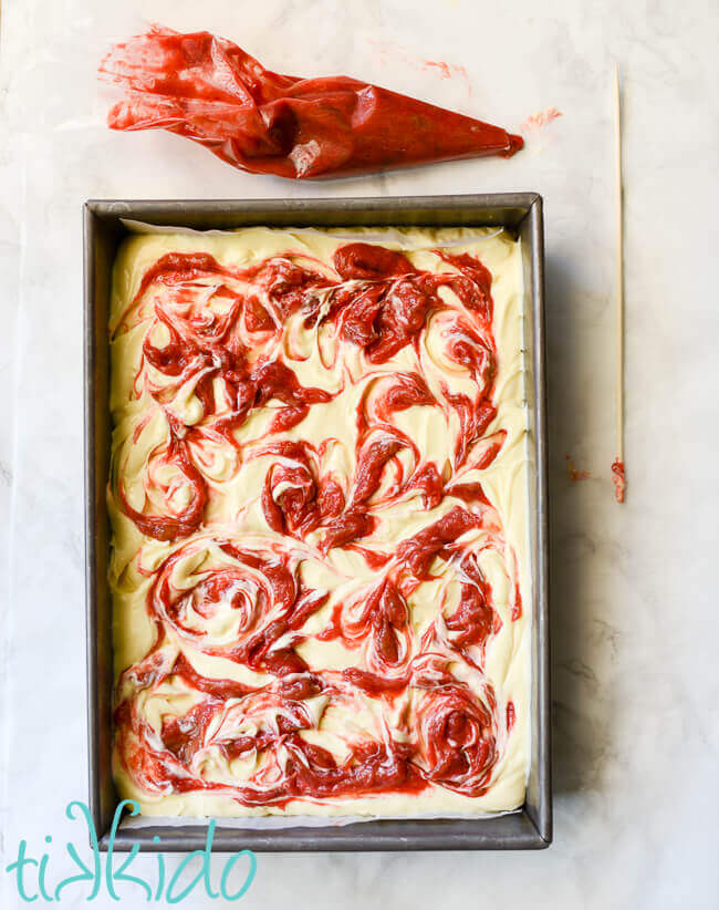 Rhubarb compote swirled into cheesecake filling batter before baking.