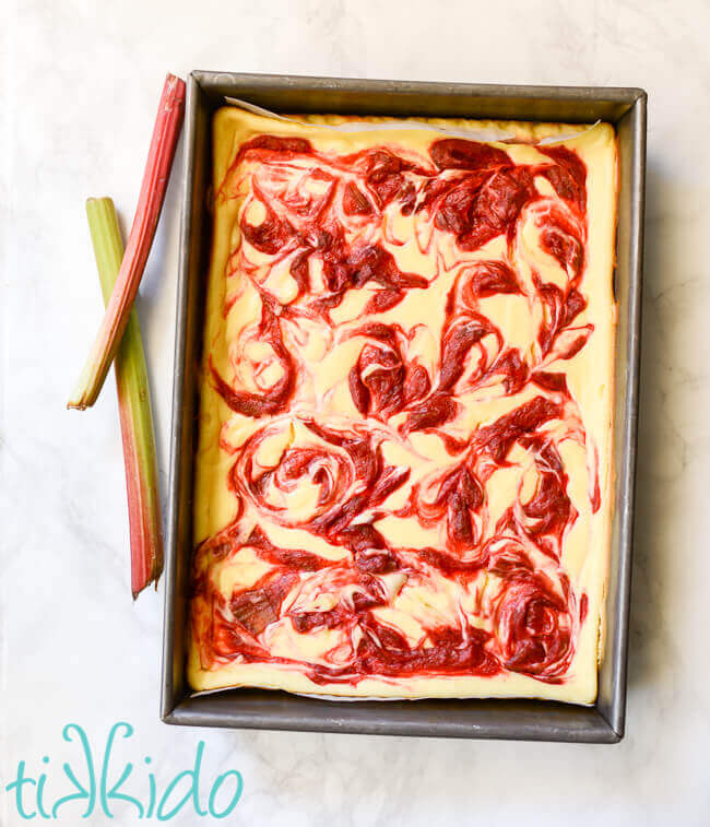 Rhubarb Cheesecake Bars baked in a 9x13 pan.