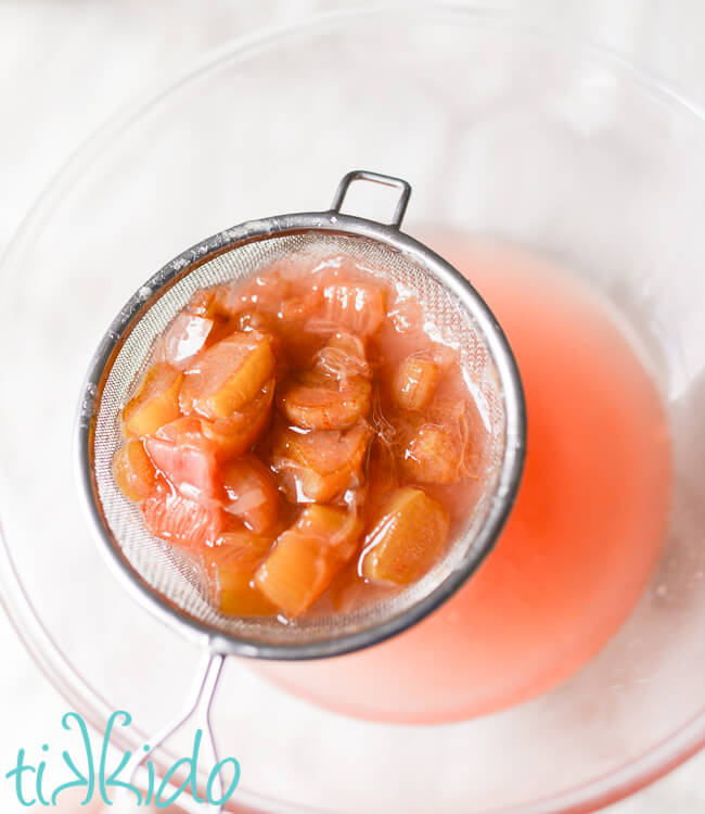 Rhubarb being drained out of rhubarb syrup.