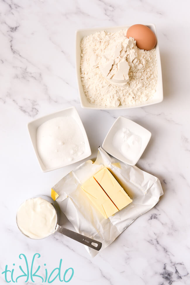 Ingredients for easy scones recipe on a a marble surface.