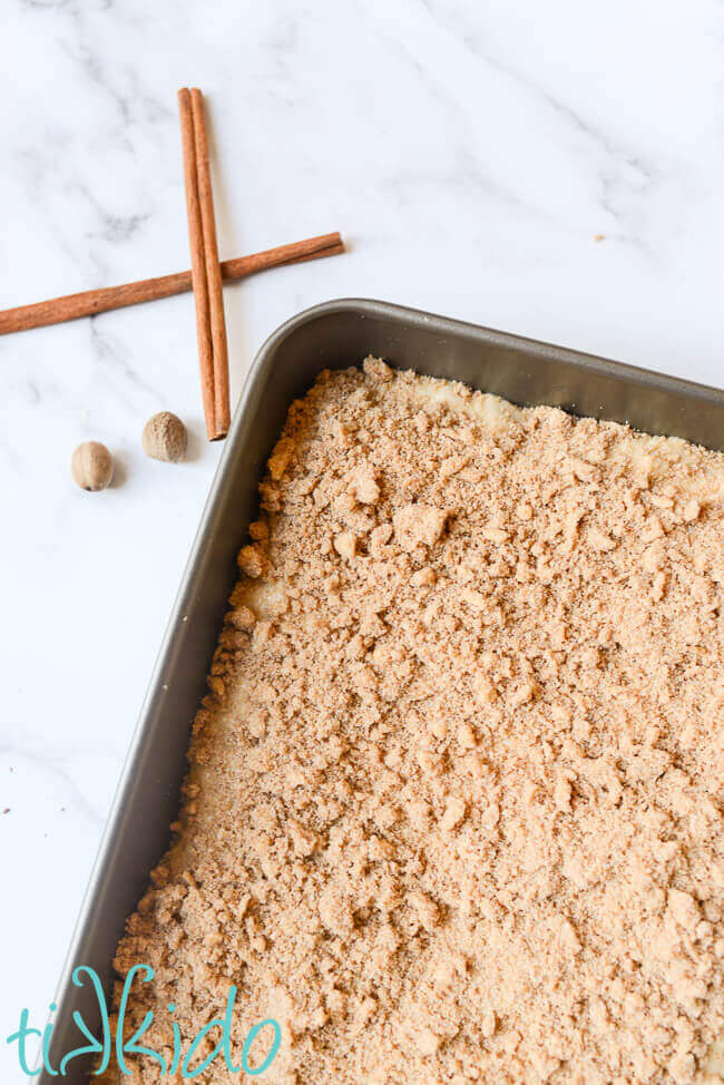 Unbaked sour cream coffee cake with streusel topping.