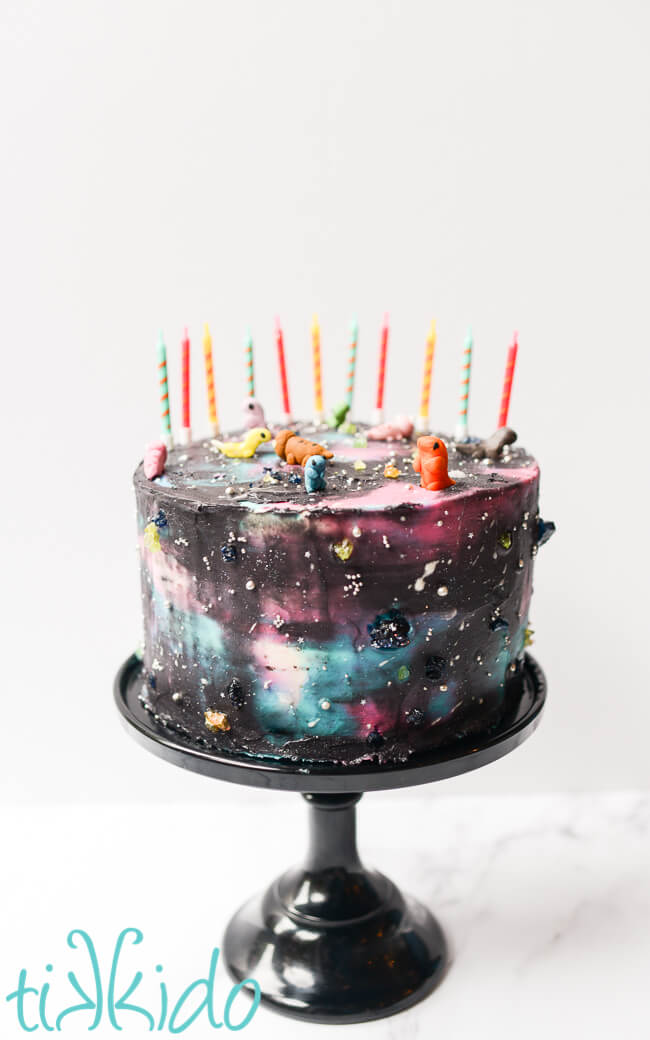 Space Dinosaur birthday cake decorated with American Buttercream Frosting.