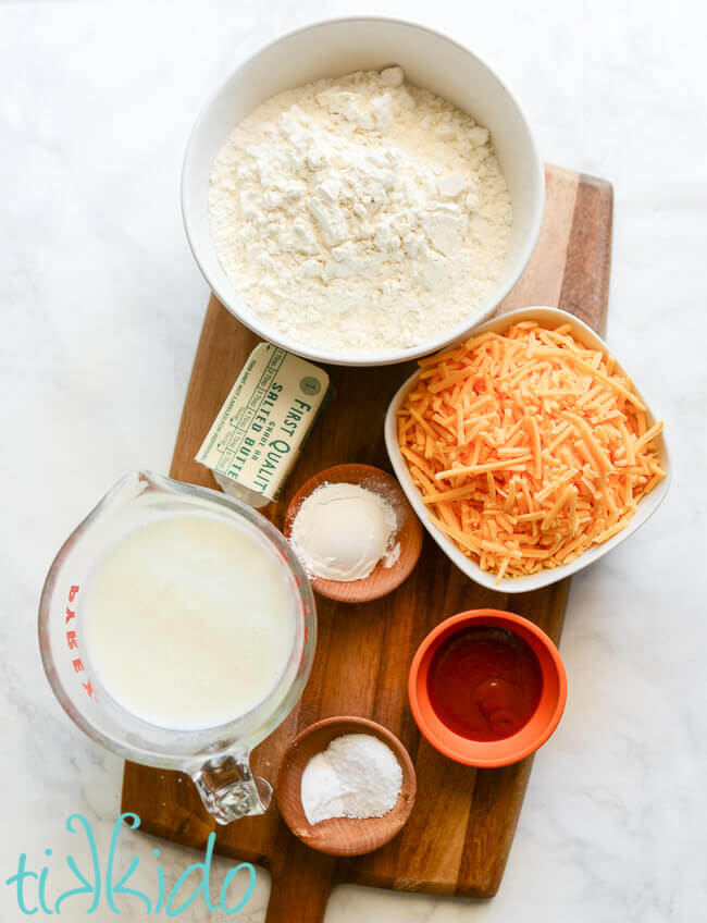 Sriracha Cheddar Buttermilk Biscuit Ingredients on a cutting board.