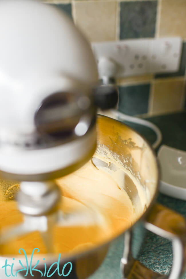 Batter for strawberry bread recipe being mixed in a Kitchenaid mixer.